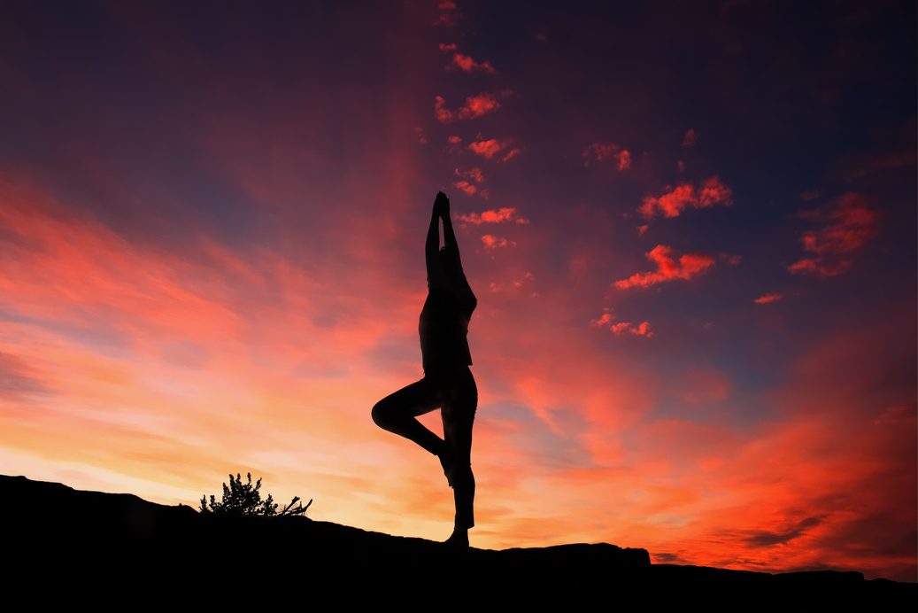 Silhouette of a Woman Doing Yoga